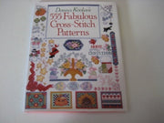 Cover of Donna Kooler's 555 Fabulous Cross-Stitch Patterns featuring vibrant designs and motifs.