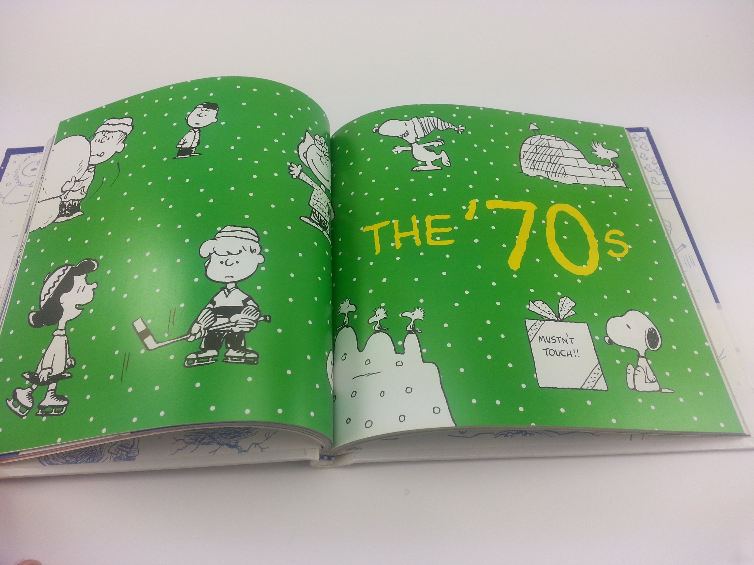The Joy of a Peanuts Christmas: 50 Years of Holiday Comics!