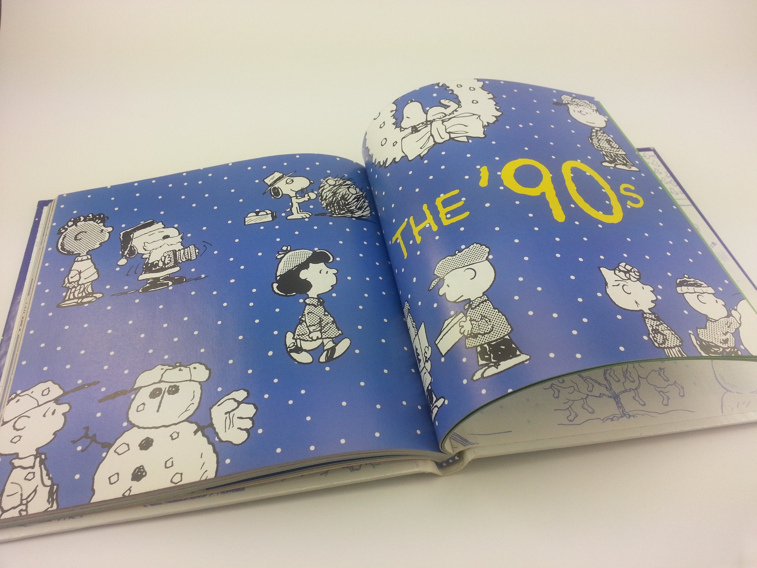 The Joy of a Peanuts Christmas: 50 Years of Holiday Comics!
