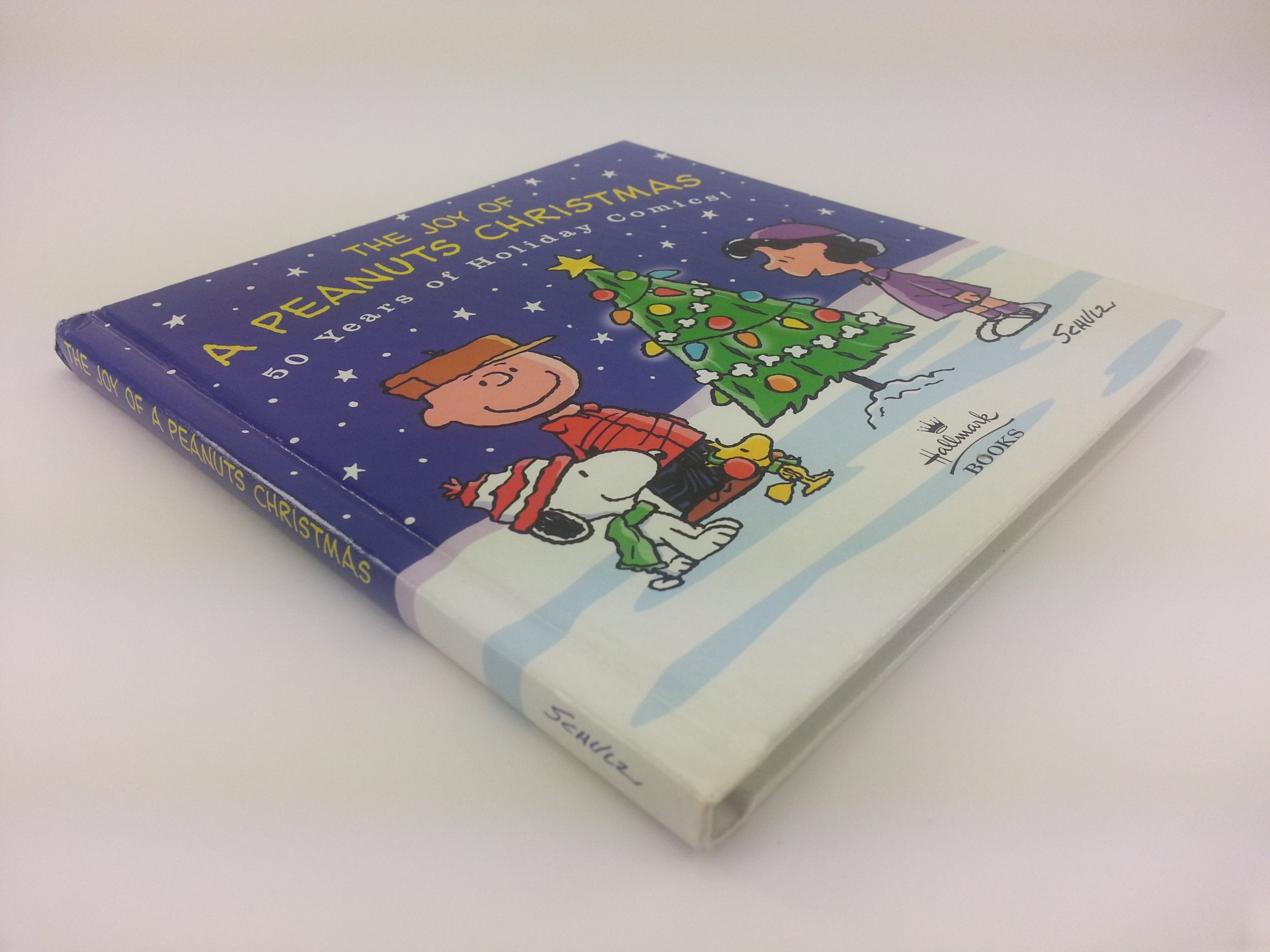 The Joy of a Peanuts Christmas: 50 Years of Holiday Comics!