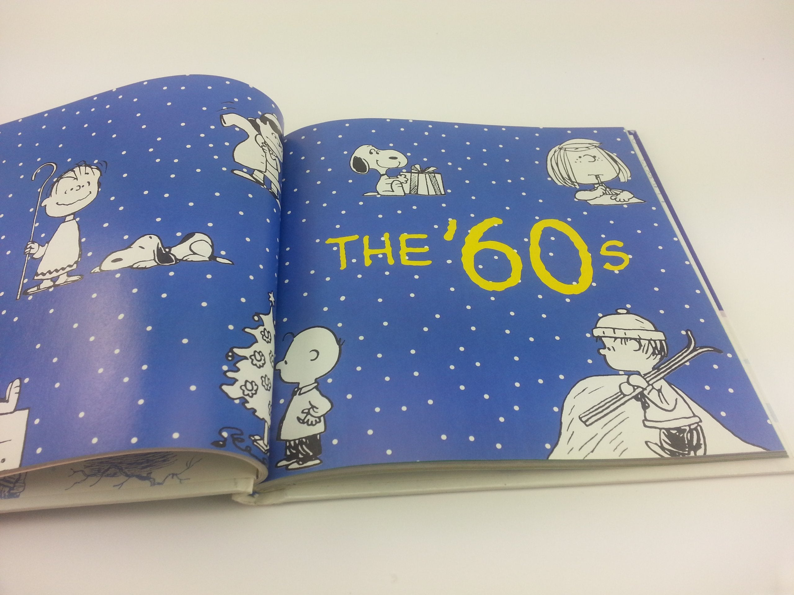 The Joy of a Peanuts Christmas: 50 Years of Holiday Comics!